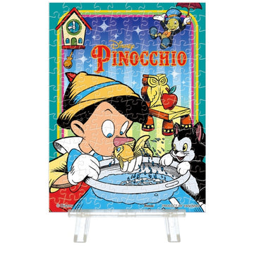 Disney Store - Pinocchio Puzzle Petit Paris (aus Kunststoff, transparente Teile) 150 Teile Disney Classics - Pinocchio - 7,6x10,2cm Mini Staffelei enthalten